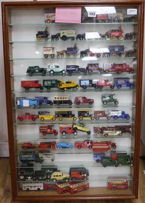 A large collection of diecast model vehicles, various, three glazed display cabinets and a box (200+)